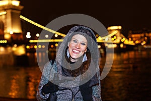 Fashionable woman teeth smile at night