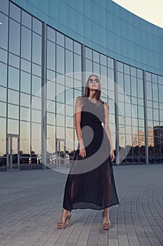 Fashionable woman on urban background