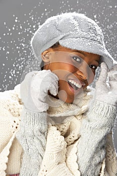 Fashionable Woman Wearing Knitwear In Studio photo