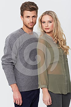 Fashionable young couple. Studio portrait of an attractive young couple.