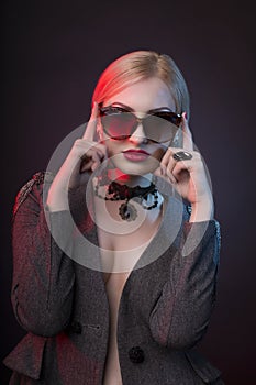 Fashionable young woman with decollete and wearing chocker