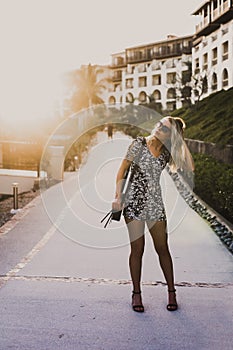 Fashionable young woman touching her hair in Mexico
