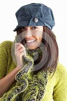 Fashionable Young Woman Wearing Knitwear In Studio photo