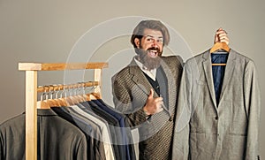 Fashioner man designing formal clothes premium quality, good choice concept photo
