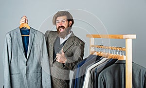 Fashioner man designing formal clothes premium quality, good choice concept photo