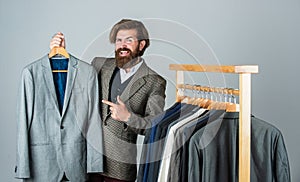 Fashioner man designing formal clothes premium quality, good suit concept photo