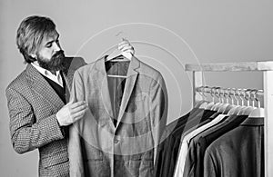Fashioner man designing formal clothes premium quality, vintage piece concept photo