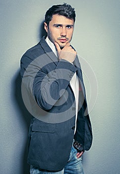 Fasion portrait of young handsome man.