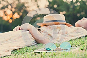 Fasion sun glasses with young woman sleeping , vintage style