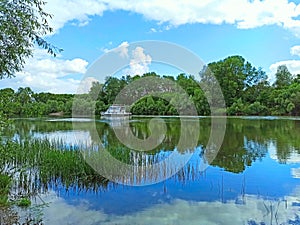 Fast boat making great rolling tourists on river. Boat trip down lake photo