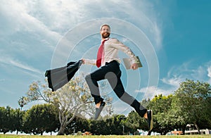 Fast business concept. Running businessman ready to run jump and sprint.