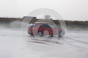 Fast car induced aquaplanning during course of advanced driving