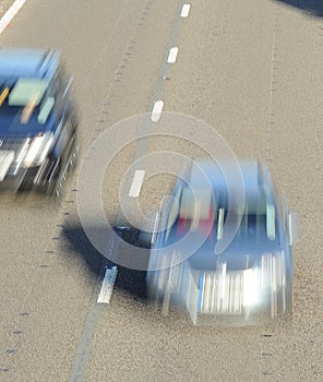 Fast cars driving on motorway