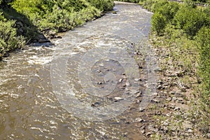 Fast current of the Gunnison river at Paonia State park, Colorado photo