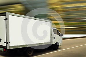 Fast delivery van on blurred background