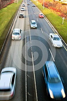 Fast driving cars on road