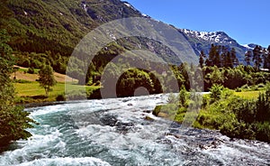 Fast flowing Oldeeiva river in flood