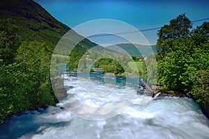 Fast flowing Oldeeiva river in flood