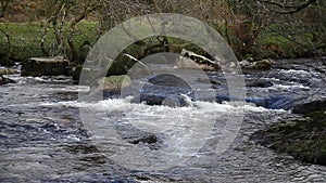 Fast flowing Rapids River , River Dart, Dartmoor, Devon,uk