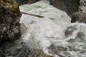 Fast flowing water at Little Qualicum Falls in BC, Canada.