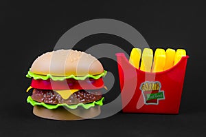 Fast food. plastic hamburger and french fries