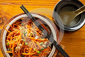 fast food slices of pork and carrots with rice and soup horizontal composition