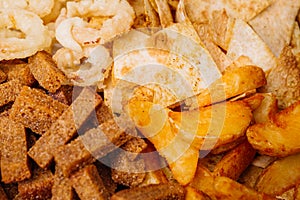 Fast food snacks composition with onion rings, crackers, baked