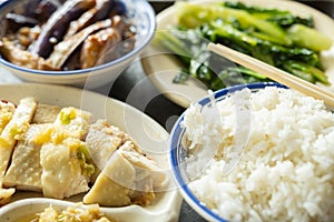 fast food of steamed chicken with eggplant and vegetable and bowl of rice