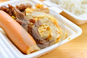 Fast food of steamed chicken leg and sausage and fried egg and cabbage and rice 2