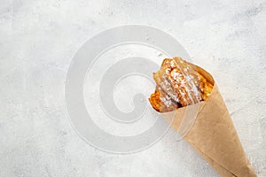 Fast food sweets - churros in paper bag