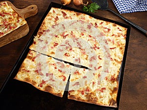 Fast Food - Traditional Tarte Flambee with Creme Fraiche, Onion and Bacon