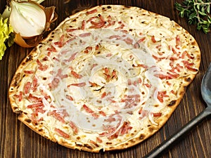 Fast Food - Traditional Tarte Flambee with Creme Fraiche, Onion and Bacon