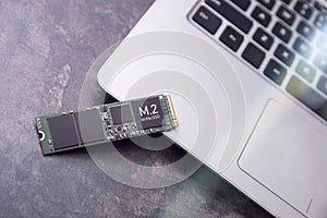 Fast M.2 Solid State Drive lies on laptop