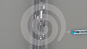 Fast motion and traffic jam on long multi-lane bridge
