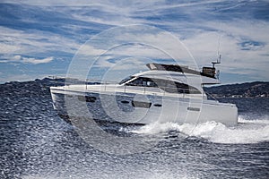 Fast motor yacht in navigation