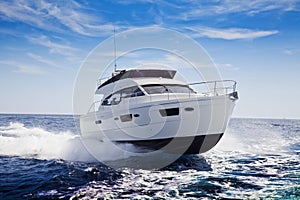 Fast motor yacht in navigation
