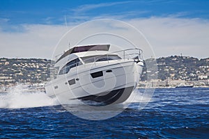 Fast motor yacht in navigation