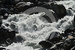 Fast mountain river Feevispa flows from Spielboden towards Saas-Fee village and Saas valley