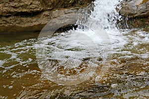 A fast mountain stream or a small mountain river