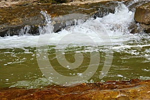 A fast mountain stream or a small mountain river