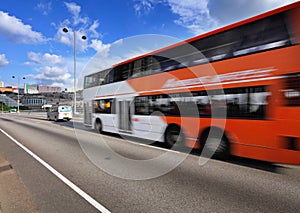 Fast moving bus on highway