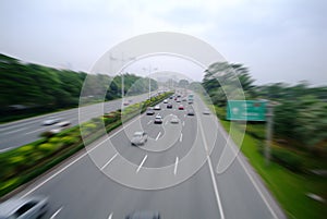 Fast moving car on road