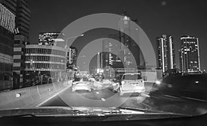 Fast moving traffic light trails at night in Bangkok