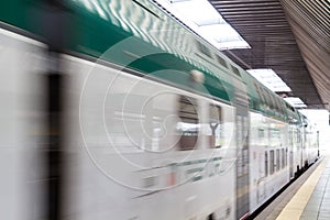 Fast Passenger Commuter Train with Motion Blur