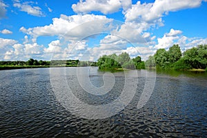 Fast river under blue sky