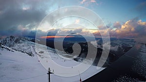 Fast running clouds over Low Tatras with magic sunset. Chopok mountain 2024 meters