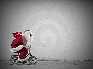 Fast Santa Claus on the bike