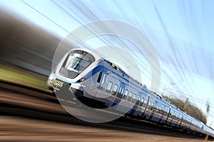 Fast train in motion photo