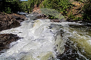 Fast Water Frozen In Action At Egan Chutes Waterfall photo