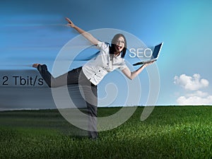 Fast woman with laptop doing SEO